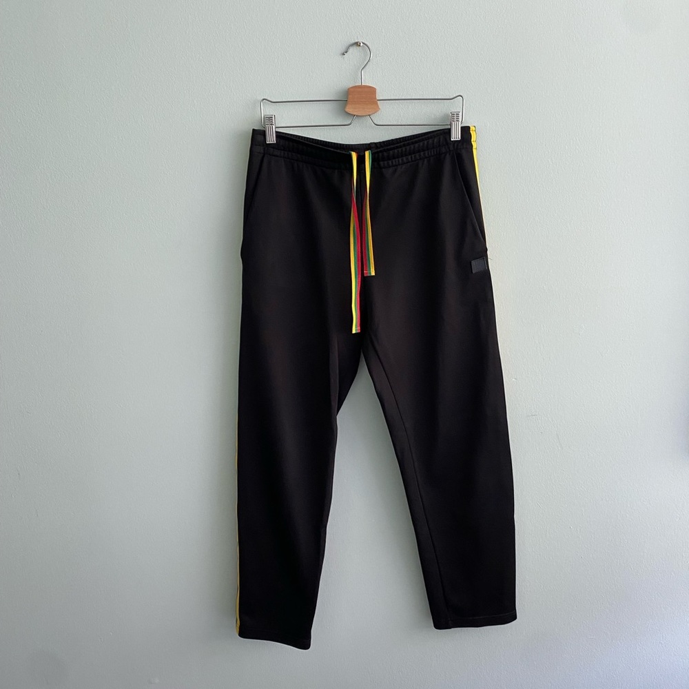 Acne Black Sweatpants with Yellow and Red Accents